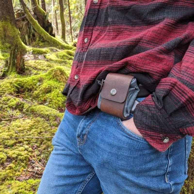 man wearing foraging pouch hip bag