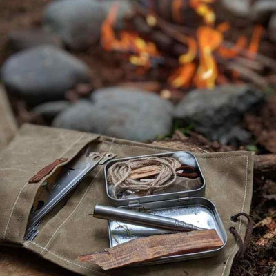 waxed canvas roll up pouch by camp fire